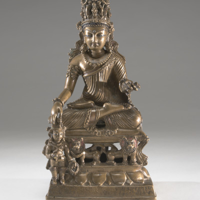 Crowned Buddha Touching the Head of a King