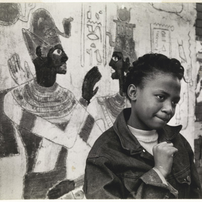 [Girl with Egyptian mural]
