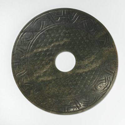 Disk with Animal Masks and Mat Design