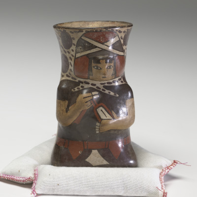 Vase in the Form of a Warrior Holding a Coca Pouch