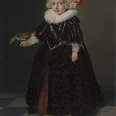 Portrait of a Boy Holding a Parrot