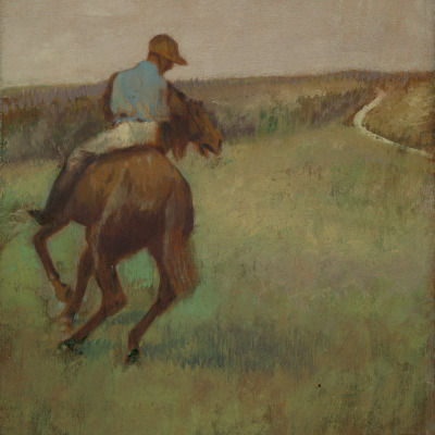 Jockey in Blue on a Chestnut Horse