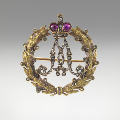 Brooch with Crowned M