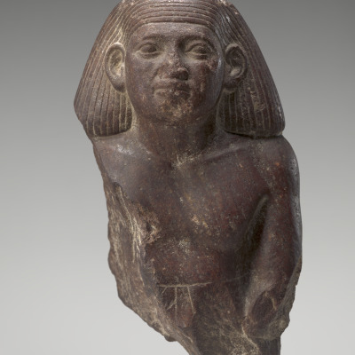 Head and Torso of a Priest of the Goddess Bastet