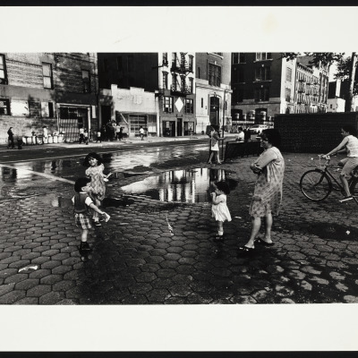 Untitled [Children Playing on Wet Street]