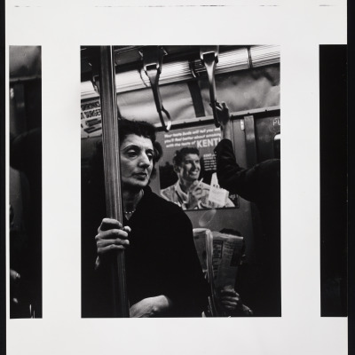 Untitled [Woman Holding Pole on Subway]